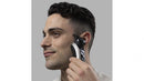 Guy trying Remington rotary shaver in cheek beard